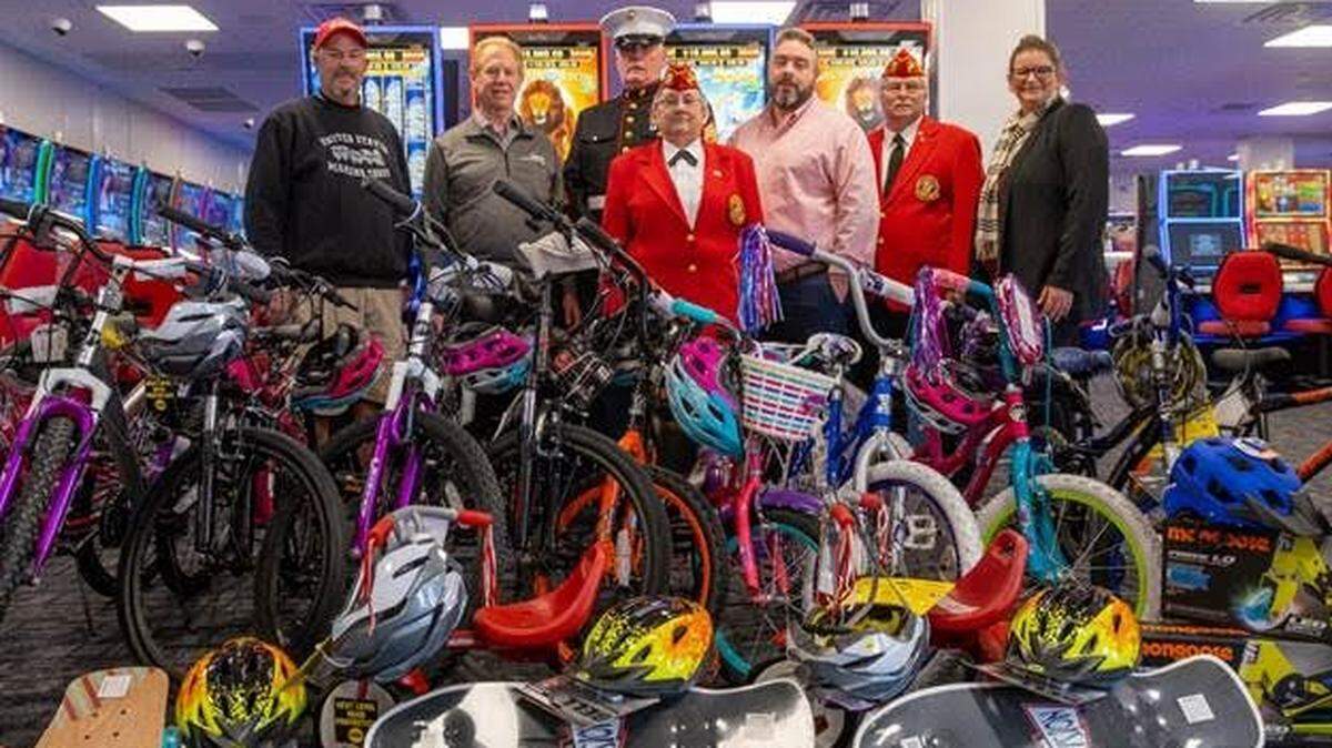 On hand recently at Catawba Two Kings Casino for the presentation of toys collected for Toys for Tots, a program operated nationwide by the U.S, Marine Corps Reserve, are (left to right): Associate Marine Jeff Tanguay, who oversees the regional campaign for York County; Chuck Kilroy, lead consultant for Delaware North; Marine Sergeant Major Tommy Ayers; Marine Sergeant Linda Scott; Dr. James Magar, who leads the Cleveland County Toys for Tots campaign; Marine Sergeant Rick Hinson; and Jennifer Elberson, Player’s Club manager at the casino. Not pictured is Rene Thomas Estes of the Cleveland County Toys for Tots program.