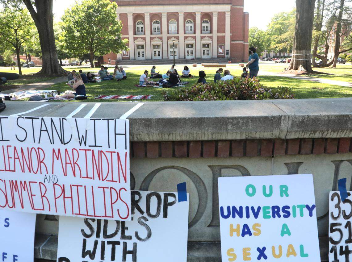 Winthrop University students sit outside Byrnes Auditorium Wednesday, as part of a campus-wide, ongoing movement against sexual assault.
