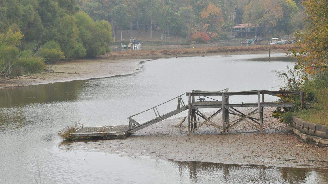 This file photo shows a boat dock sitting on the lake bottom due to low water in Crowders Creek on Lake Wylie. Some in South Carolina who are concerned with a Charlotte Water interbasin transfer request worry how the lost water might impact downstream areas during drought.