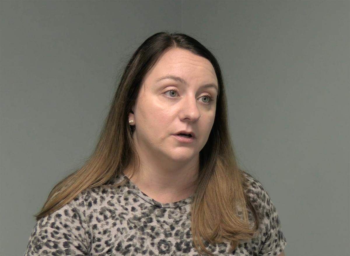 Lacey Layne discusses a petition to keep children’s books in the children’s section of the library.