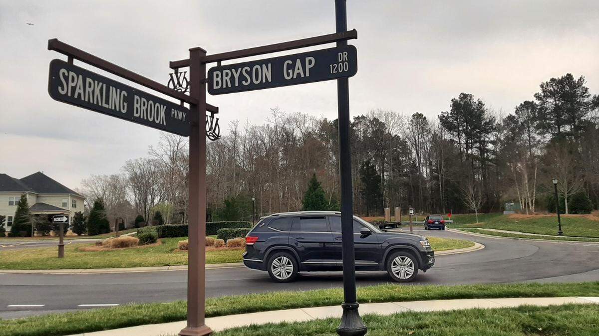 The end of Sparkling Brook Parkway, at the foreground of the roundabout shown here, would be extended to allow for hundreds of new homes as part of the Cresswind project.