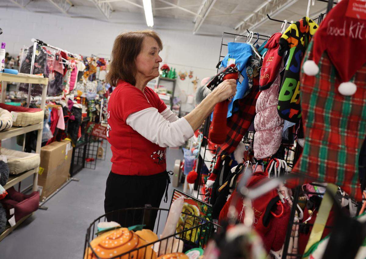 Elaine Siegel works at the Humane Society of York County’s Christmas Store on Tuesday in Fort Mill.