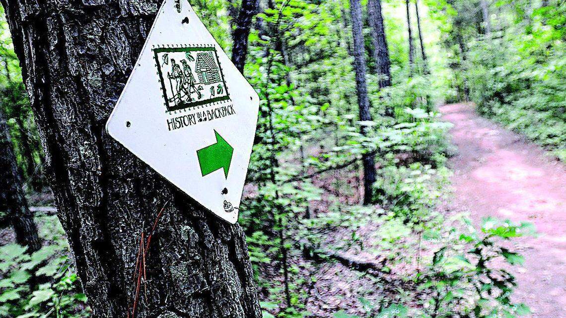 An arrow points the way to one of the trails at Anne Springs Close Greenway in Fort Mill. The greenway is a stop on the latest proposed route for the Carolina Thread Trail, a 112-mile trail linking scenic sites in 15 North Carolina and South Carolina counties.
