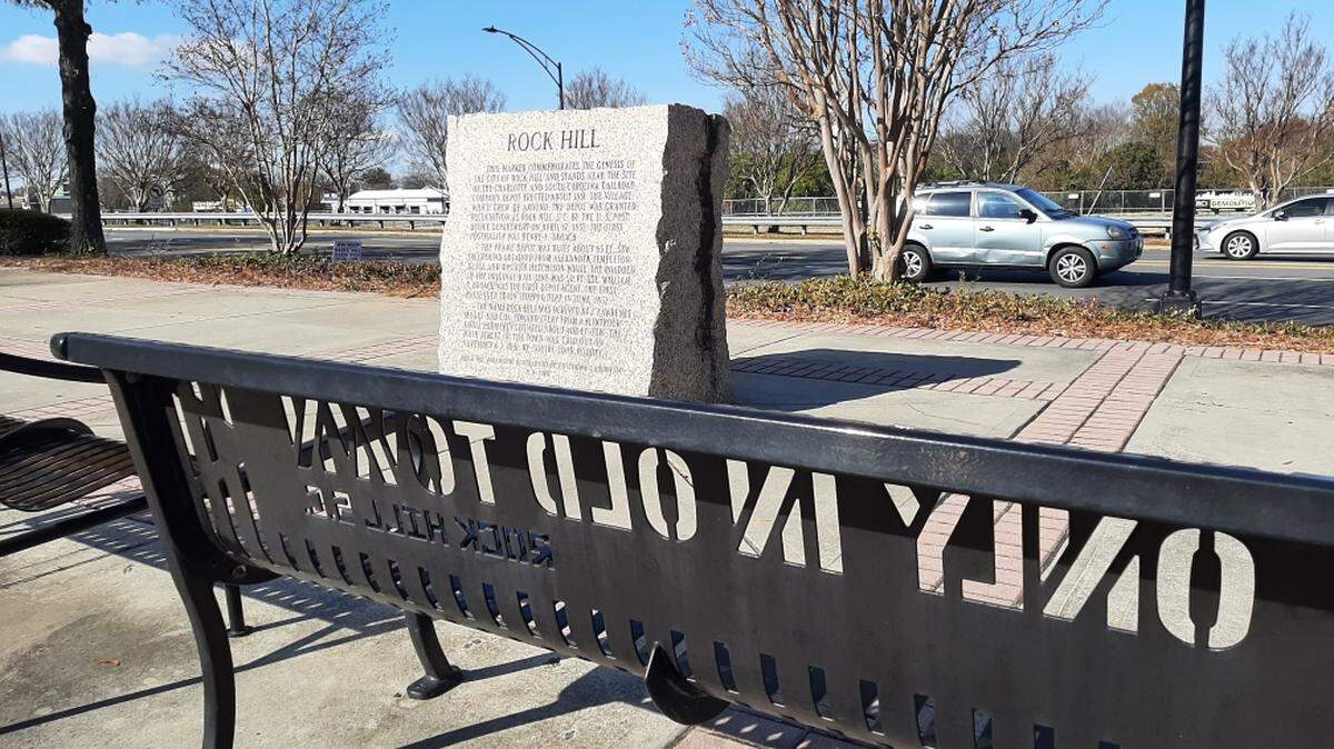 An Only in Old Town bench sits beside a marker where Rock Hill was founded, just beside Dave Lyle Boulevard near Main Street. The Storyline linear park will go through the area, with a new pedestrian bridge across Dave Lyle.