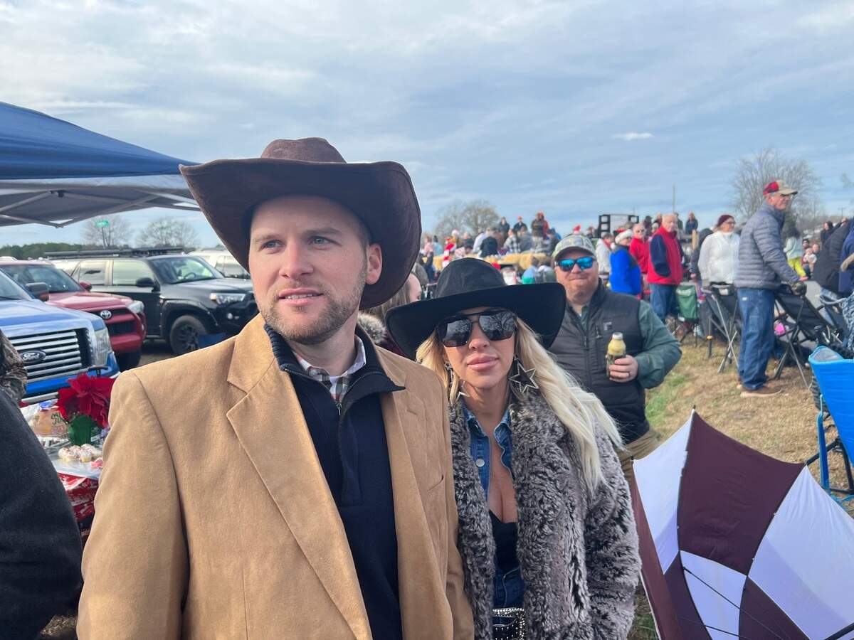 Patrick Hamilton (left) works as an assistant county engineer for York County and says he and his family love the parade. Patrick has been attending the parade since 2001, while his wife, Dana (right, black fedora), has been attending the parade since 1992.