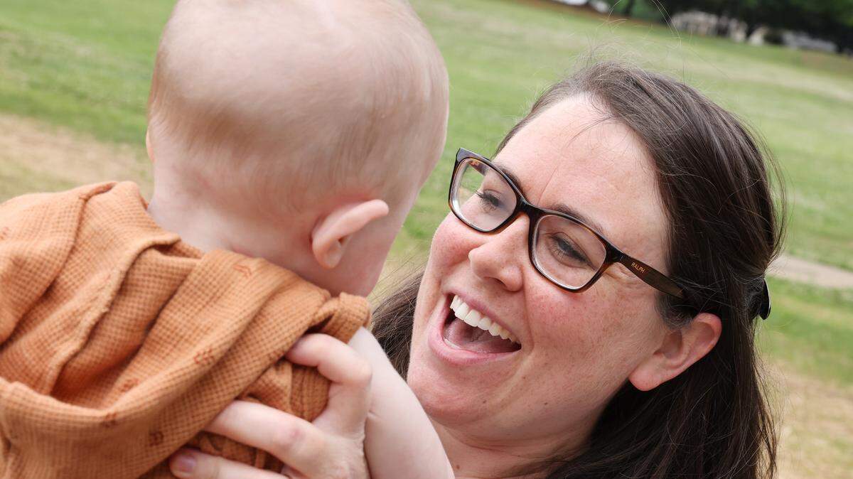 Fort Mill’s Maggie Szeman plays with her son at a park Wednesday in Fort Mill.