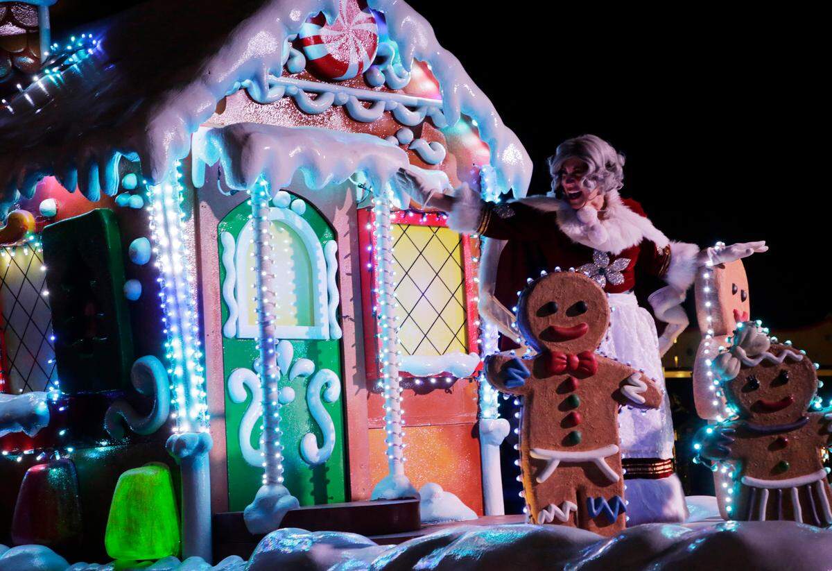 Mrs. Claus waves to spectators at Carowind’s WinterFest Wonderland Parade Monday at the theme park in Fort Mill