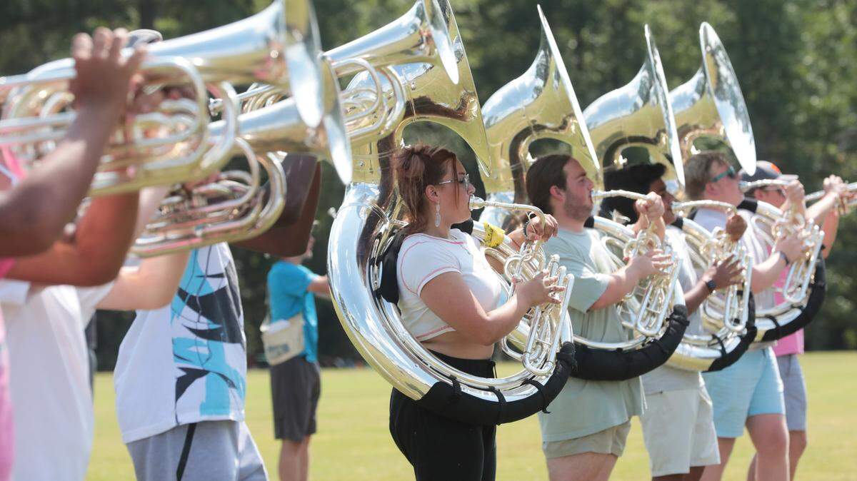 The Northwestern High School marching band rehearses Tuesday at school.