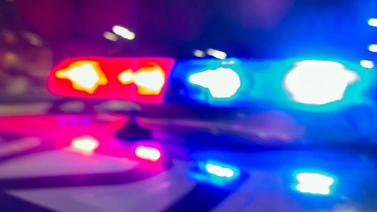 Police car lights in night time, crime scene, night patrolling the city. Abstract blurry image. Photo by Getty Images This is a stock image downloaded from Getty Images. It is a Royalty Free image.
