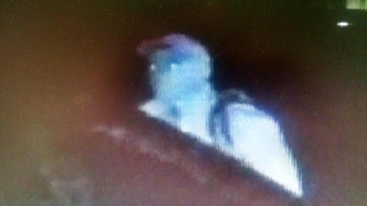 Still image of a suspect in a string of Fort Mill car break-ins. York Co. sheriff’s investigators believe the man is wearing a mask.