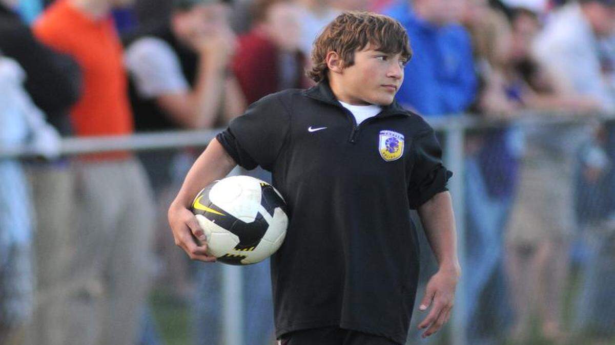 
Adam Smith, the Northwestern soccer team manager, walks the sidelines during the Upperstate Championship in 2009. 
