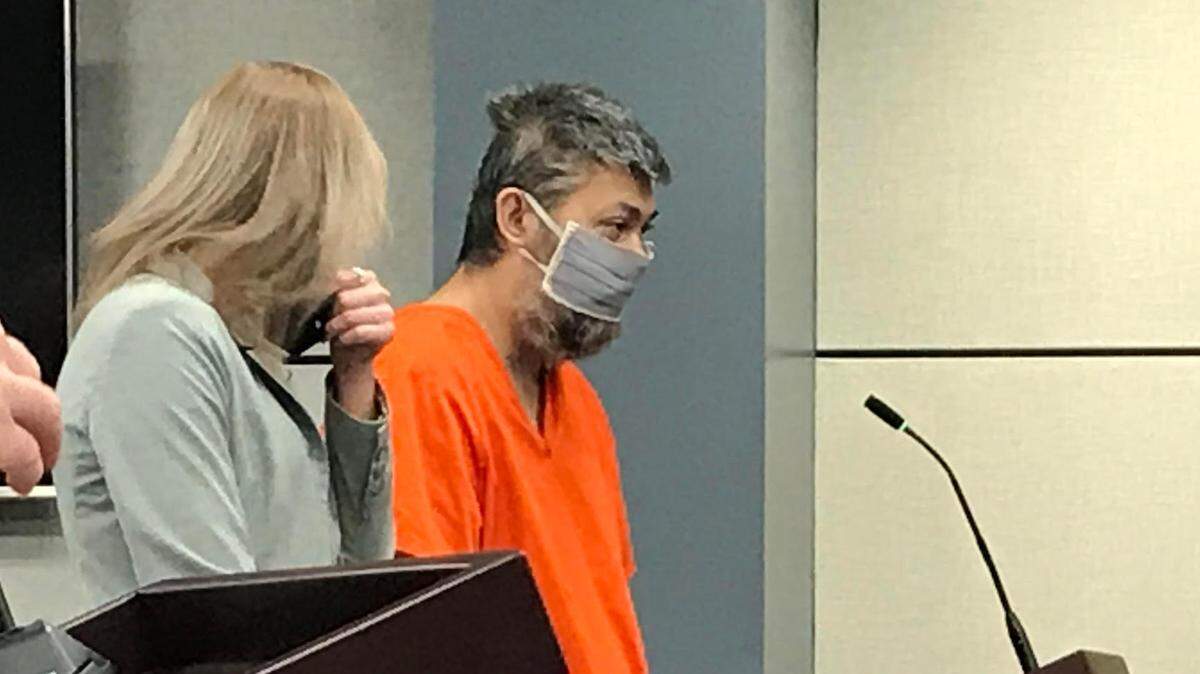 Jacob Lee Cabasal, right, with his lawyer Cassity Brewer, in court Dec. 2, 2021 where he pleaded guilty to arson in fires that destroyed a neighbor’s home.