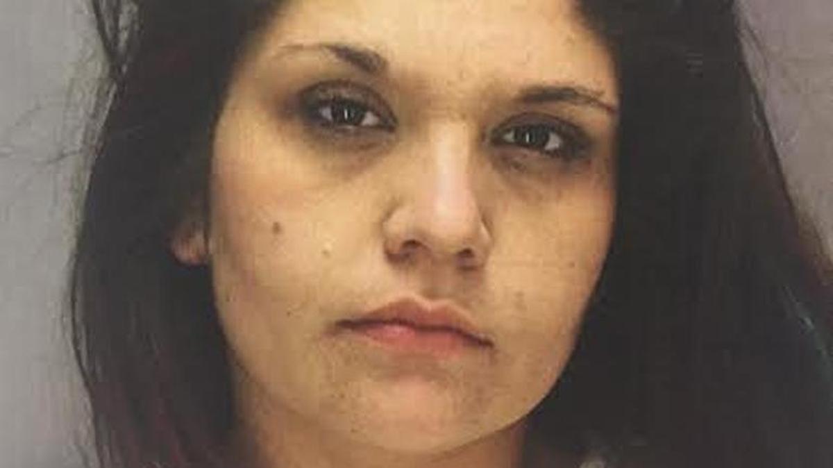 Tiffany Smith was charged with child neglect after leaving her three kids in a hot car for nearly half an hour, Rock Hill police say.