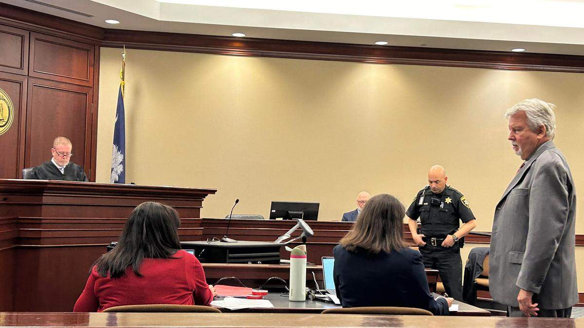South Carolina Family Court Judge W. Greg Seigler presided in Lancaster County court Thursday in the case of a 15-year-old charged in an April 1 Walmart shootout. Prosecutor Melissa McGinnis, center, and defense lawyer Mark Grier, right, confer.