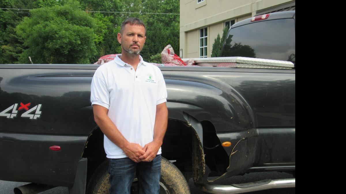 
Eddie Nivens of York stands next to his truck that was stolen last week, then later recovered. 

