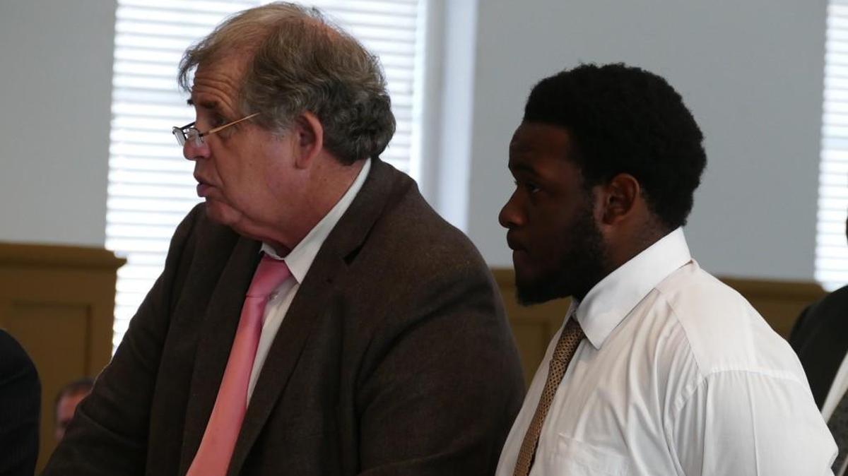 A judge granted bond Thursday for 16-year-old Jaden Hampton, right, who is accused with another teen of a violent summer crime spree that included two home invasions and the burglary of a coach’s home. Hampton was accompanied in court by his attorney, Jack Swerling.