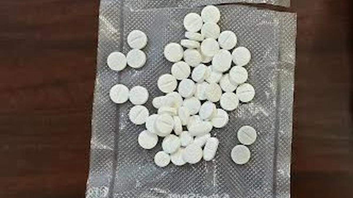 File image: Pressed pills containing the opioid fentanyl, seized by Chester County, S.C. deputies on Dec. 22, 2021. A Charlotte Observer investigation recently showed how police and courts face challenges to crack down on drug dealers under a new law called “death by distribution.”