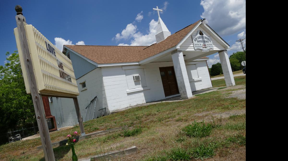 
A small vase of flowers placed under the marquee of New Harvest Freewill Baptist Church was the only sign of life at the church Friday. Pastor Darrell Morgan was shot and killed by Lancaster County sheriff’s deputies Thursday after allegedly pointing a gun at and threatening the deputies, who were responding to a domestic dispute between Morgan and his estranged wife.
