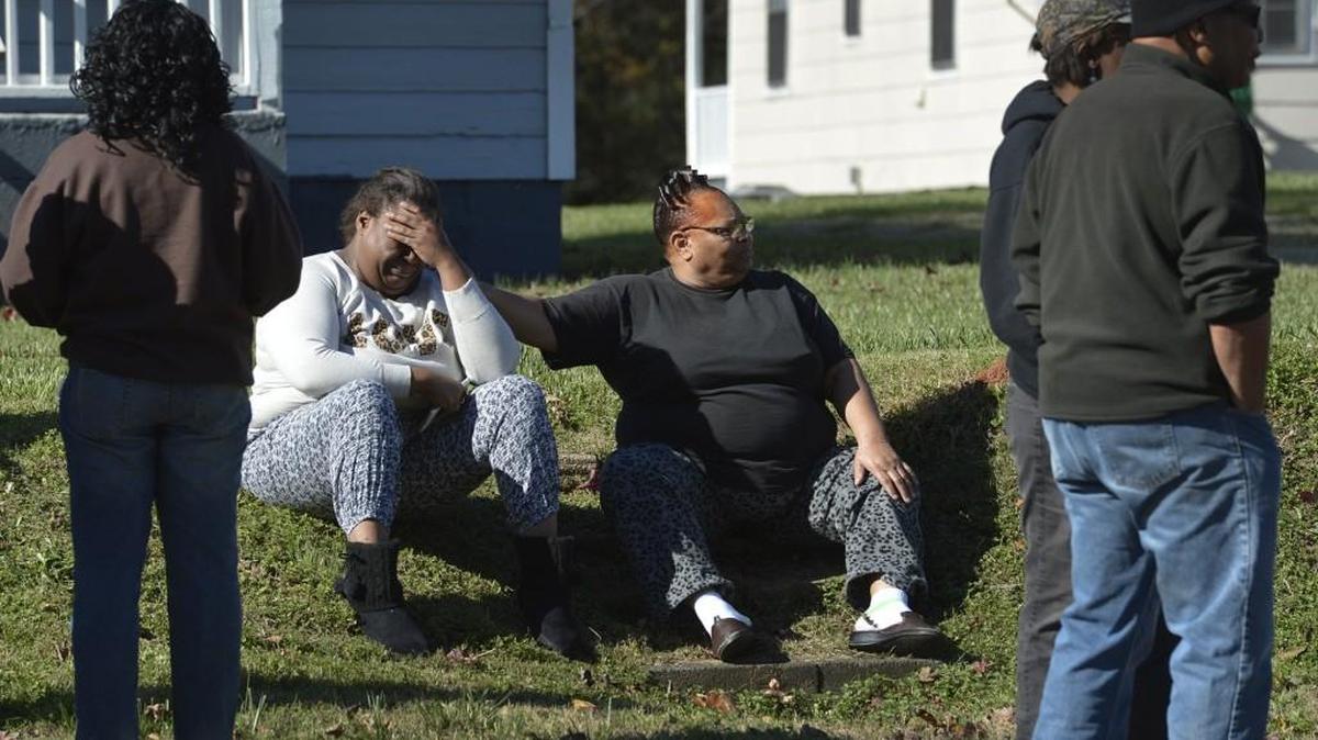 Lots of emotion as people gather near the house where three people were found shot to death Friday morning in the 9500 block of China Grove Church Road in Pineville.