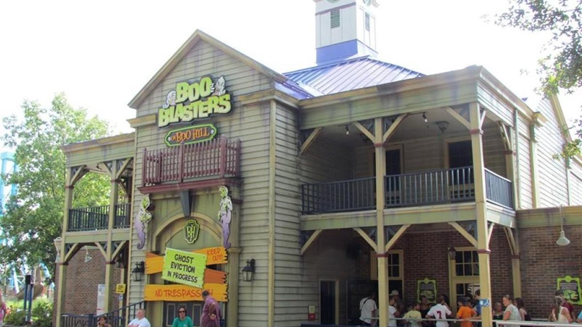 A guest at Carowinds shoved the operator of the Boo Blasters on Boo Hill ride out of the way to go onto the tracks and retrieve a cellphone that she had dropped.