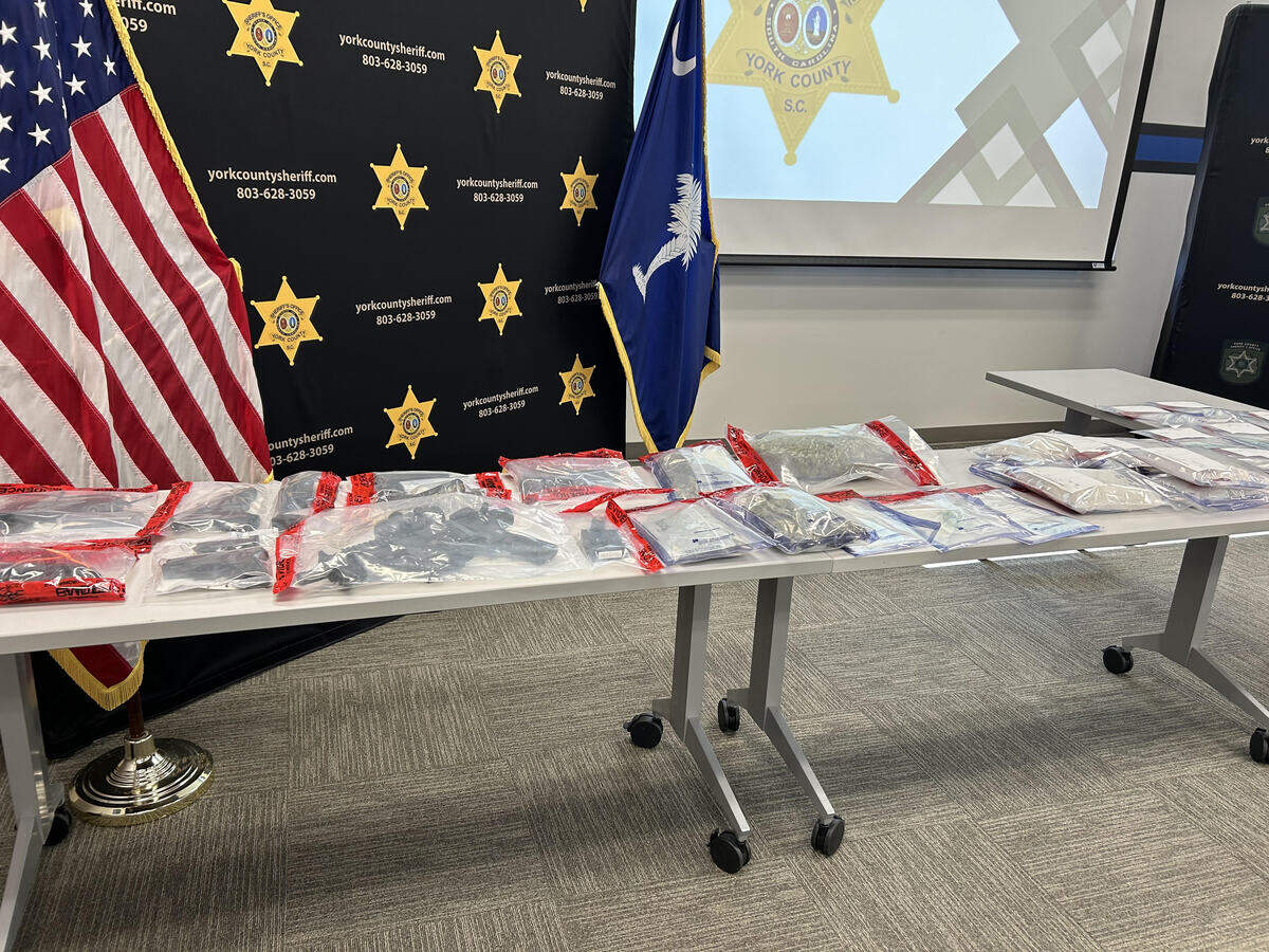 Police showed drugs and guns seized during a Sept. 4 raid near Clover in York County at a sheriff’s office news conference on Sept. 23.