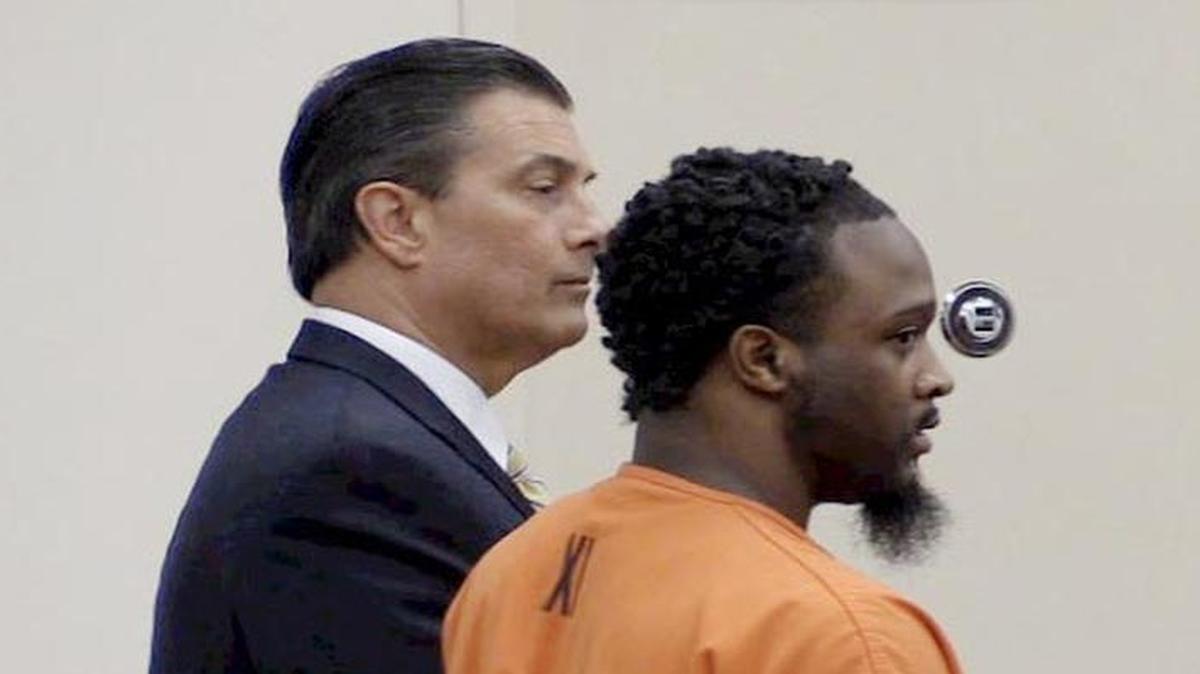 
Donquavious Davis, right, was sentenced to 40 years in prison Monday after pleading guilty earlier this month to the June 2014 shooting death of Santario McCoy. Prosecutors say Davis, pictured here with his attorney, 16th Circuit Public Defender Harry Dest, shot McCoy in a jealous rage because McCoy was dating the mother of Davis’ child. 

