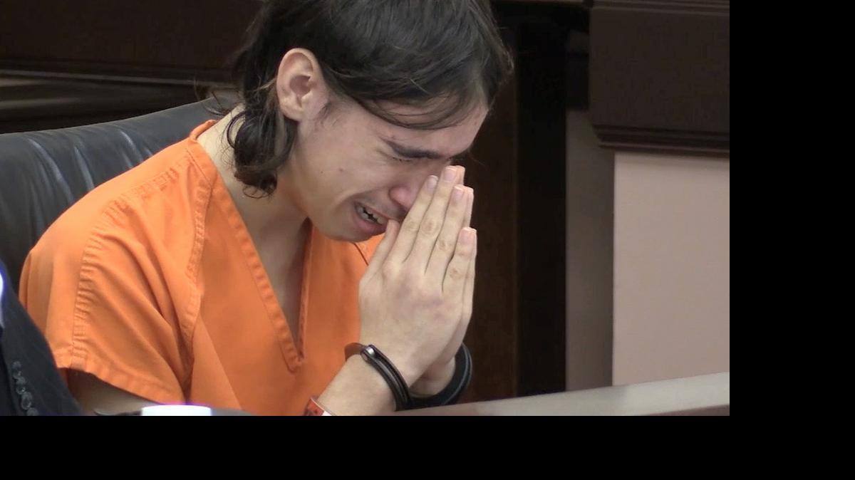 
Jacob Morgan reacts in court during a preliminary hearing to determine probable cause. He is accused of intentionally setting the fire that killed his 14-month-old brother, Joshua. 
