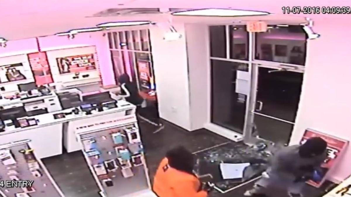 Three masked men burglarized the T-Mobile store on Cinema Drive early Monday.