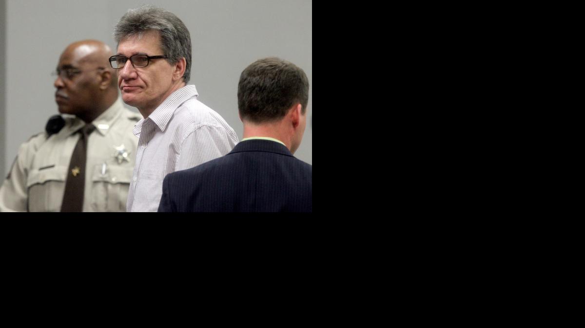 
FILE - In this Nov. 16, 2011, file photo, Danny Hembree looks back at family members in the courtroom during his murder trial at the Gaston County Courthouse in Gastonia, N.C. The North Carolina Supreme Court ordered a new trial Friday, April 10, 2015, for death row inmate Hembree, who once wrote, “Kill me if you can, suckers,” in a letter from prison to his hometown newspaper. 
