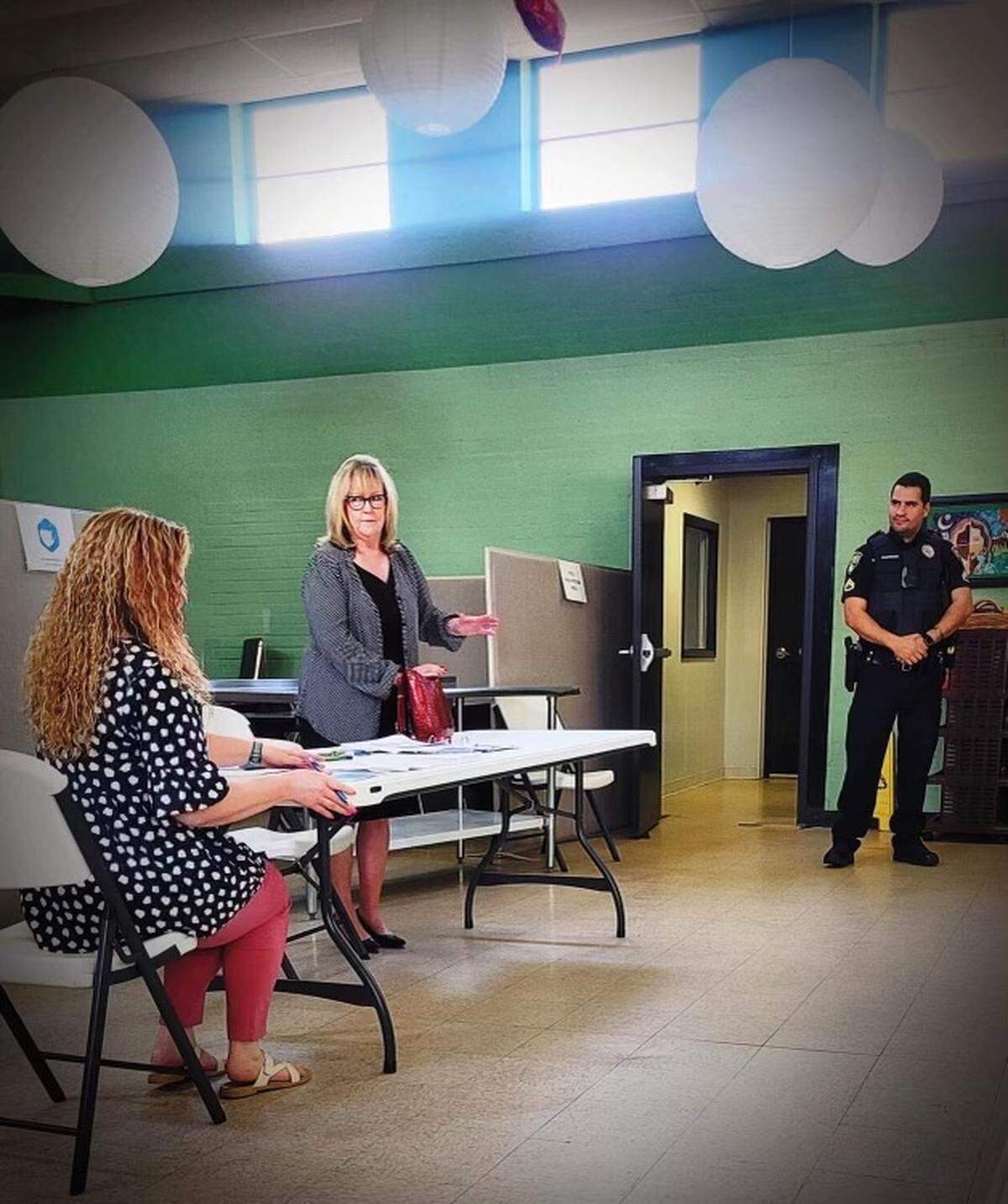 Municipal Judge Jane Modla (standing, grey jacket) presides over all cases in Rock Hill’s Homeless Court Program.