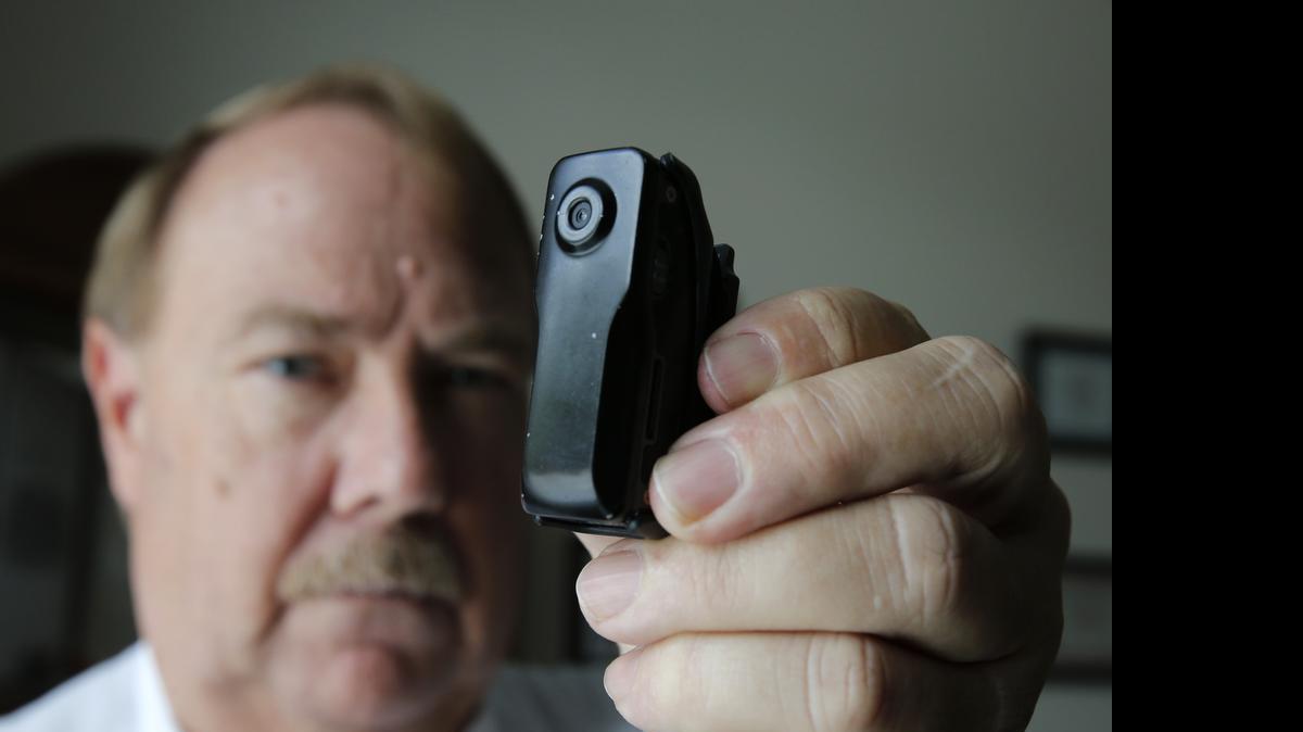 
Lt. John Poole, Administrative Lieutenant and Training & Standards Officer with the Chester Police Department shows a body camera that their officers wear.
