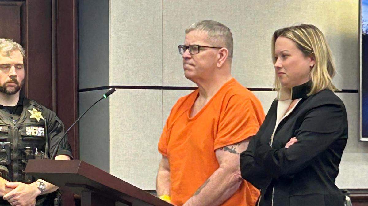 William Dean Jefferis, in orange jail clothing, in York County court on April 1, 2025, next to his lawyer, public defender Melissa Rogers.
