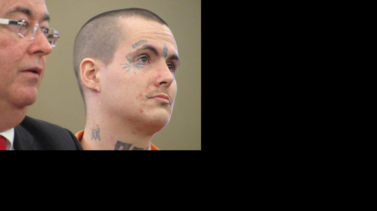 
David Adam Pate, who has a split tongue and several gang and other tattoos including the word Satan, was sentenced to life in prison in court Thursday. Pate killed Rickey James in October 2013 and left the body under brush where the victim was later found by children playing.
