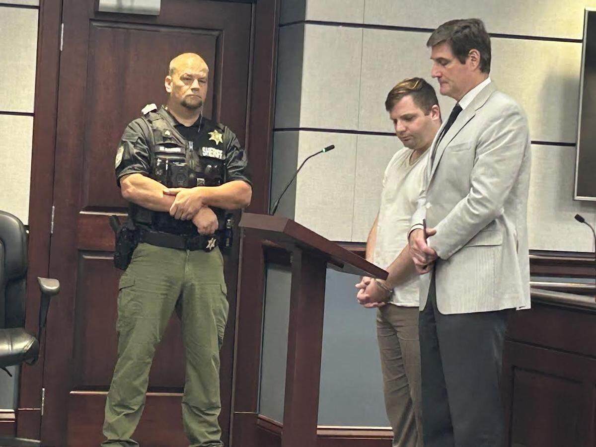 Erickson Lee, center, in court Friday Sept. 6, 2024. Lee, a former North Carolina police officer, was sentenced to nine years prison for child sex crimes while a volunteer at a Fort Mill, South Carolina church.