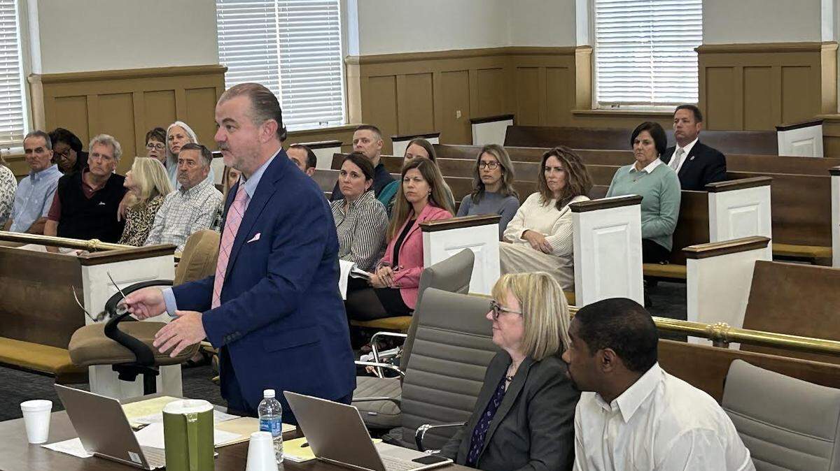 Jason Connell Palmer, right, of Charlotte, in Chester County, South Carolina court with his lawyers on Oct. 28, 2024. Palmer is accused of reckless homicide and other charges from a 2022 crash on Interstate 77 where a 7-year-old boy from Matthews, N.C. died.
