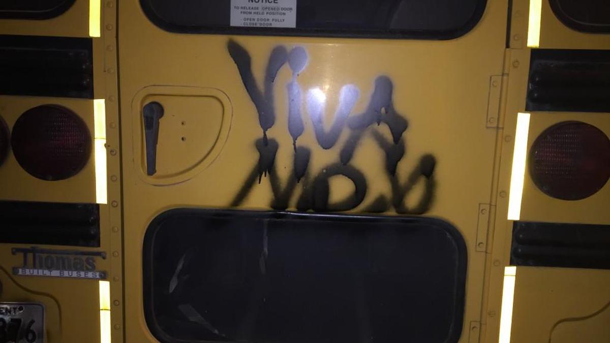One of six Lancaster County school buses that were vandalized with spray-painted gang graffiti and profanity.