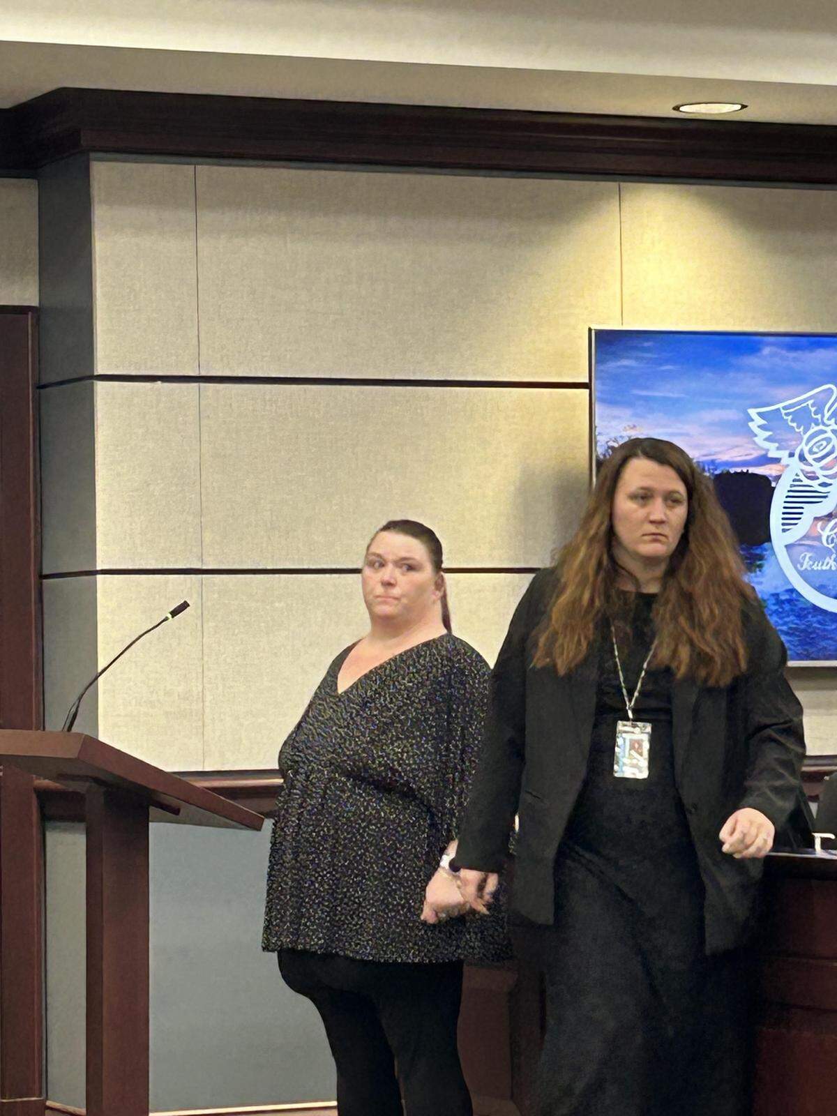 Leigh Flynt Kohn, left, with her lawyer, Katherine Christenbury, right, in York County criminal court on May 18.