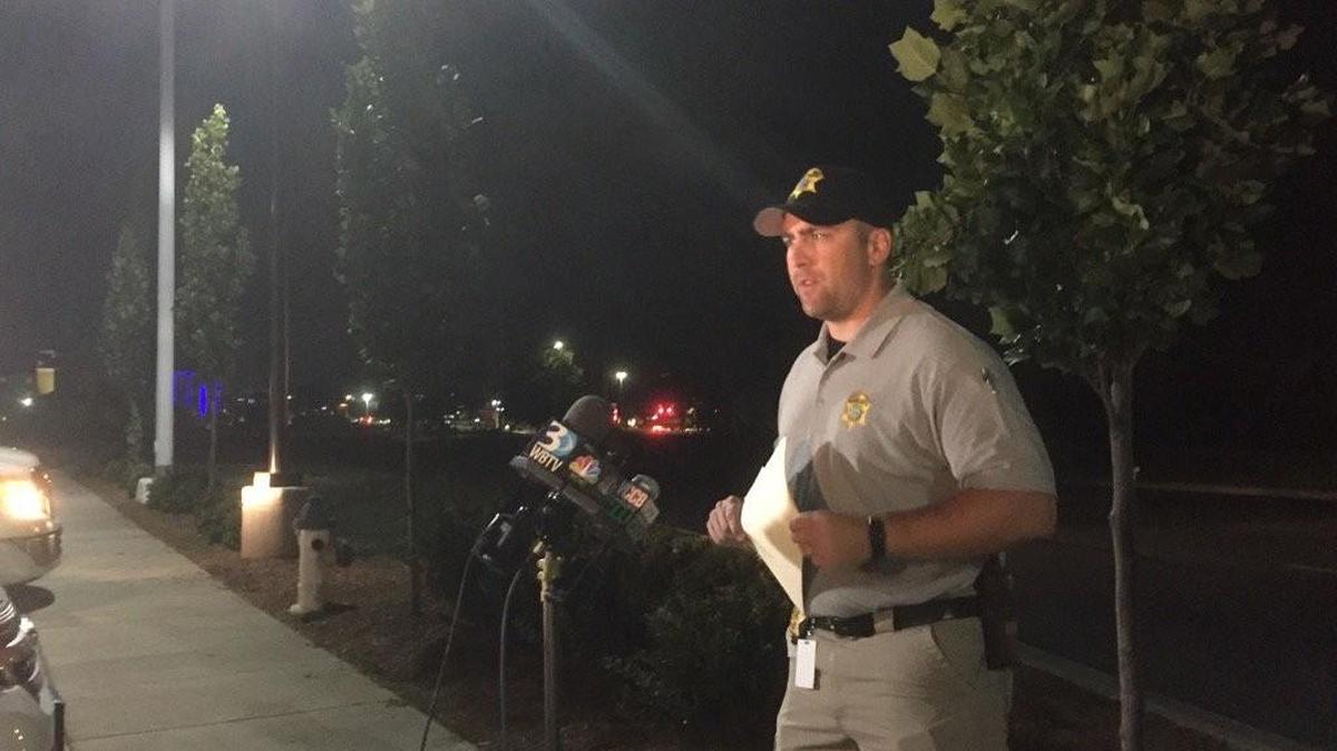 York County sheriff’s spokesman Trent Faris talks to reporters about the shooting in a Carowinds parking lot late Monday night.