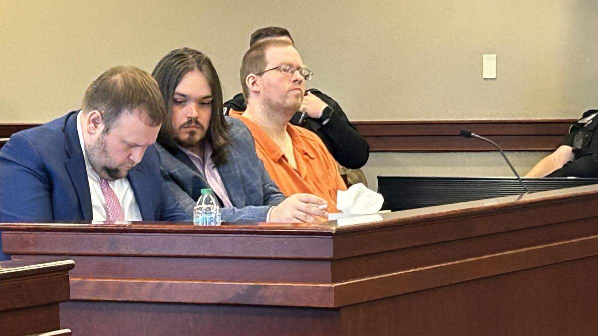 Donnie Ray Birchfield Jr., in orange with his legal team, in Lancaster County, South Carolina, court on Dec. 17, 2025.