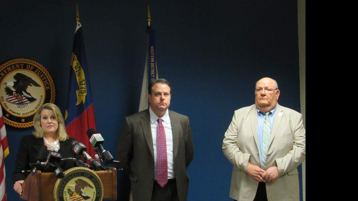 
Acting US Attorney Jill Westmoreland Rose, left, with 16th Circuit Solicitor Kevin Brackett and York County Sheriff Bruce Bryant at a press conference Wednesday to announce the federal indictment charges against 12 known gang members connected to the 2014 killing of Doug and Debbie London.
