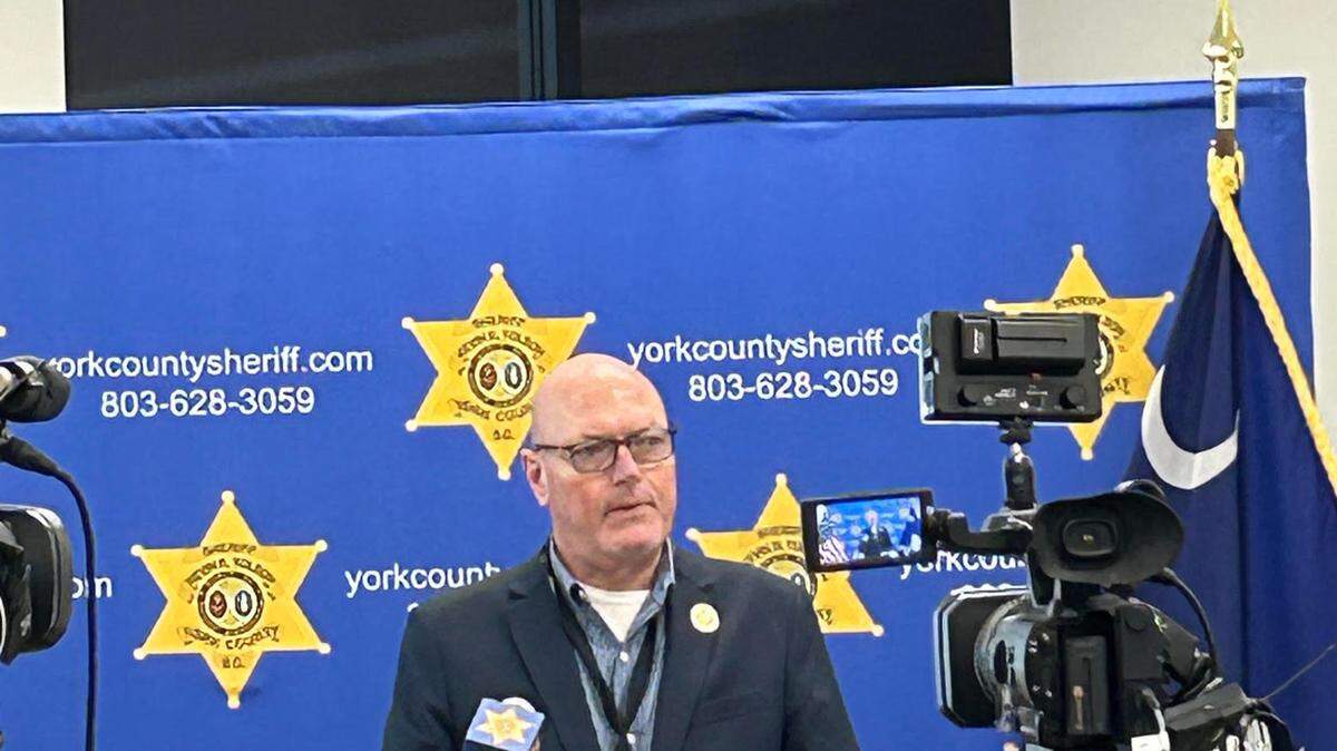 Sheriff Kevin Tolson discusses a fraud scheme on Friday.