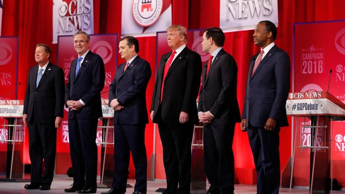 Republican presidential candidates, from left, Ohio Gov. John Kasich, former Florida Gov. Jeb Bush, Sen. Ted Cruz, R-Texas, businessman Donald Trump, Sen. Marco Rubio, R-Fla., retired neurosurgeon Ben Carson take the stage before the Republican presidential debate at the Peace Center Saturday in Greenville.
