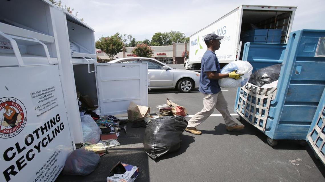 
Linwood Jones with MAC Recycling collects donated items from the clothes bins at the McConnells Corner Shopping Center on Heckle Boulevard in Rock Hill.
