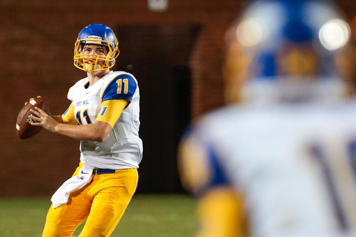 Fort Mill’s #11 Rogan Wells drops back for a pass as Northwestern hosts Fort Mill in their region 3-4A opener, 9-25-2015.