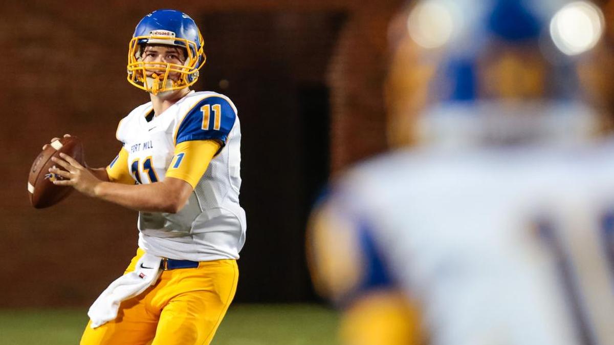 
Fort Mill's #11 Rogan Wells drops back for a pass as Northwestern hosts Fort Mill in their region 3-4A opener, 9-25-2015.
