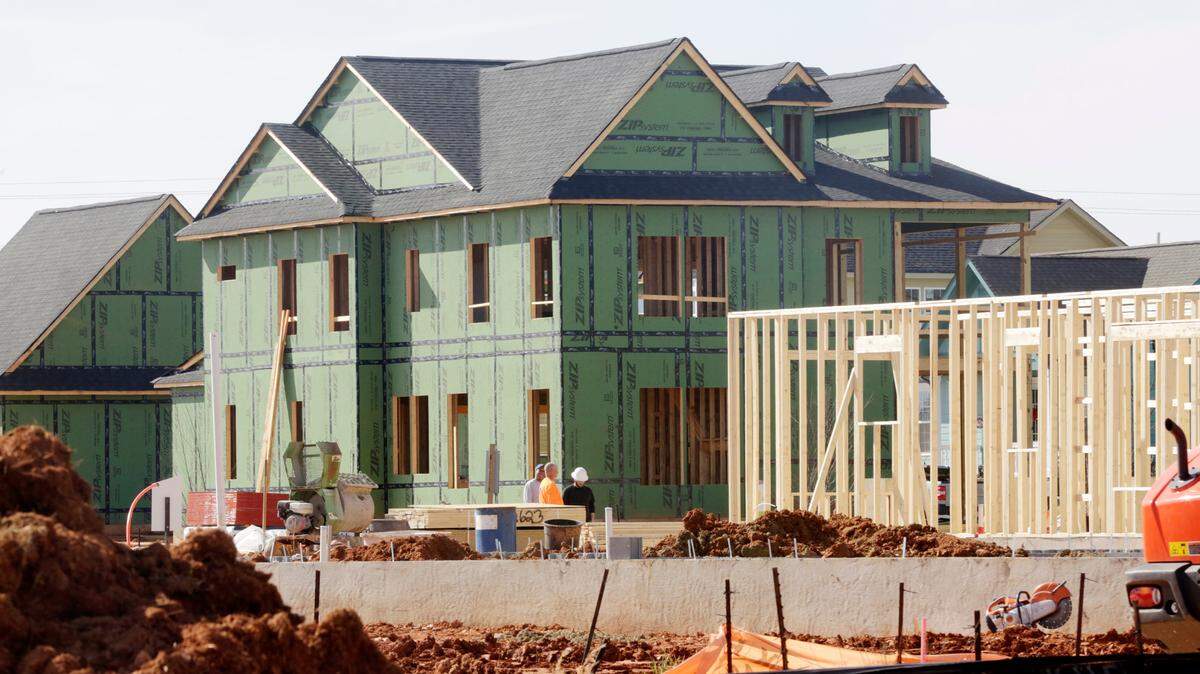 A crew meets in front of a home under construction in Rock Hill’s Riverwalk neighborhood Tuesday. The past three years brought steady increase for Rock Hill residences.