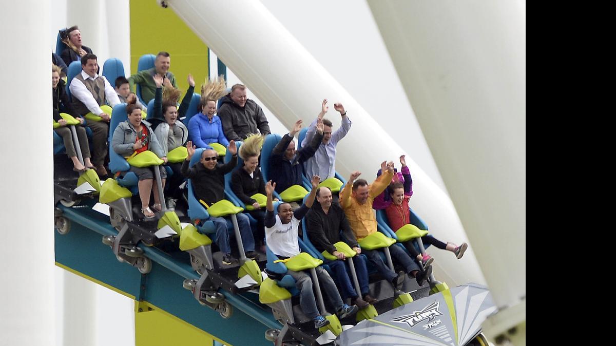 
Roller coaster riders enjoy Carowinds' new Fury 325, the world tallest and fastest giga coaster, during media day on March 25. The train races through hills and curves at speeds up to 95 mph.
