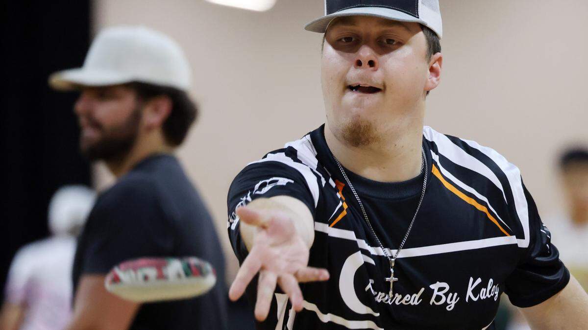 A visitor to the Rock Hill Sport and Event Center plays cornhole Friday at the American Cornhole League World Championships.
