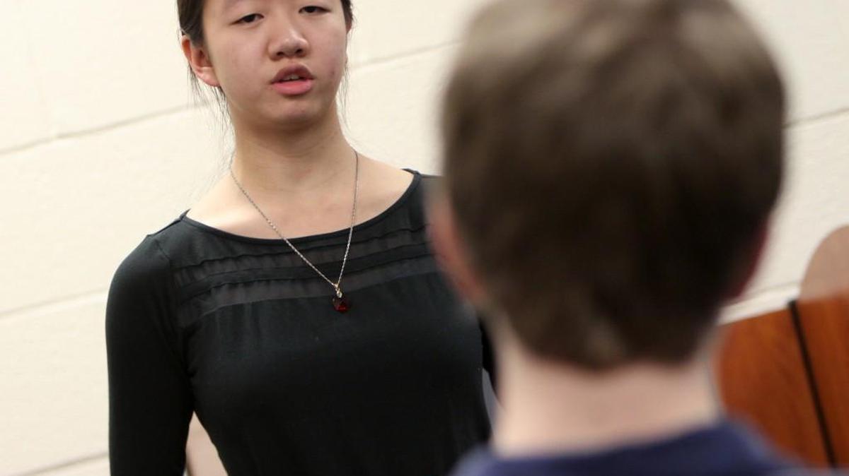 Fort Mill High School students Sonia Xing, left, and Jack Vidt practice for the state mock trial competition.