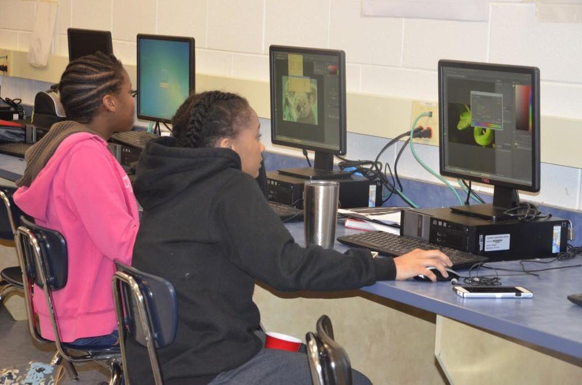  2018 Indian Land High School freshman Zoiah Aikens, 14, left, and sophomore Imoni Gordon, 15, right, complete an assignment using computers. Lancaster County School District Superintendent Jonathan Phipps said technology is not a given for rural districts like Abbeville, which he led for three years.